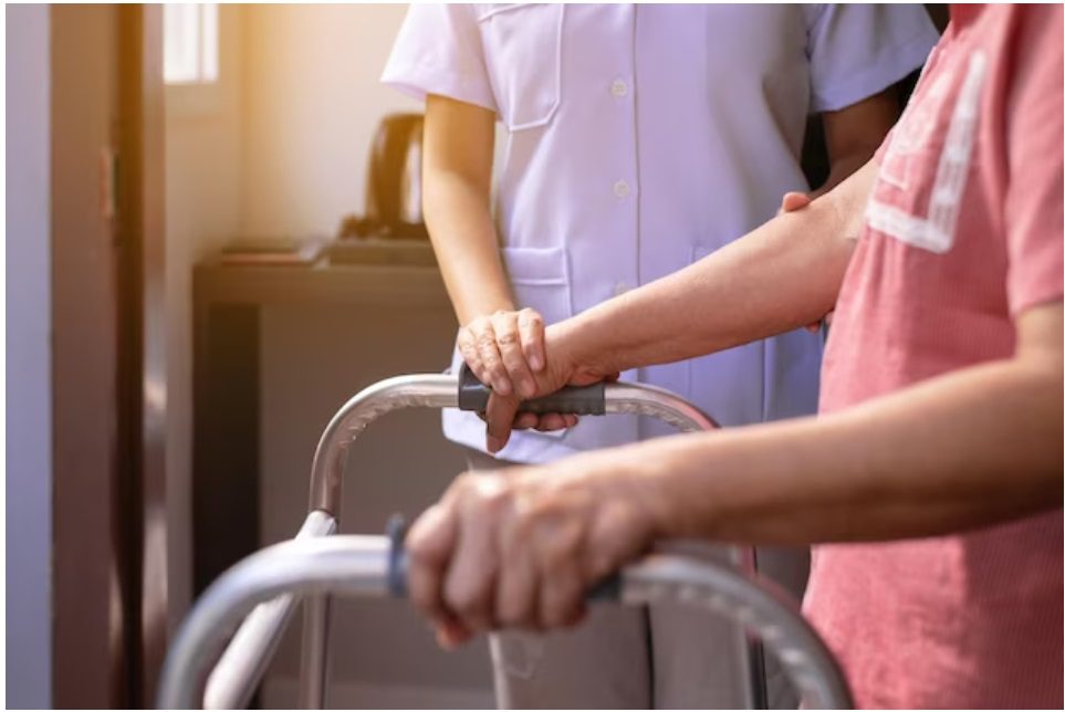 Home health aide assisting a client in Hoboken, NJ, highlighting personalized care services by Prime Care, Inc.